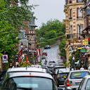 stockphoto, stockfoto, lange winkelstraat met autoos, shopping street with cars in Houlgate, Normandi